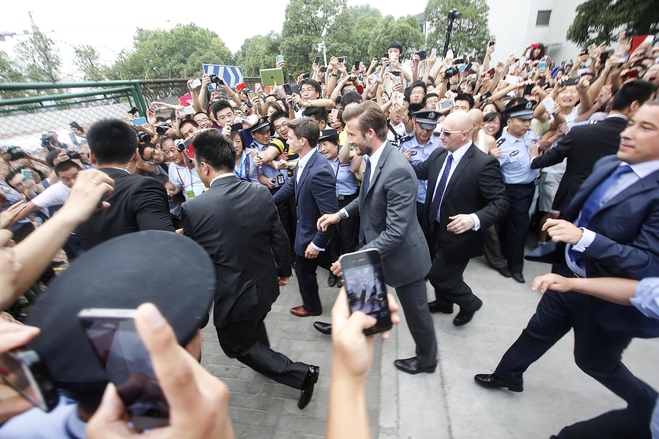 Photos: Beckham Shows Up in Shanghai, Seven Injured in Ensuing …